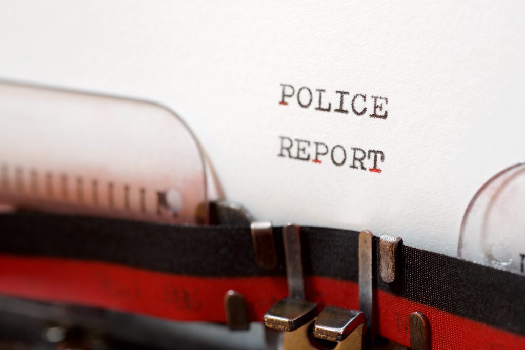 Police report phrase written with a typewriter.