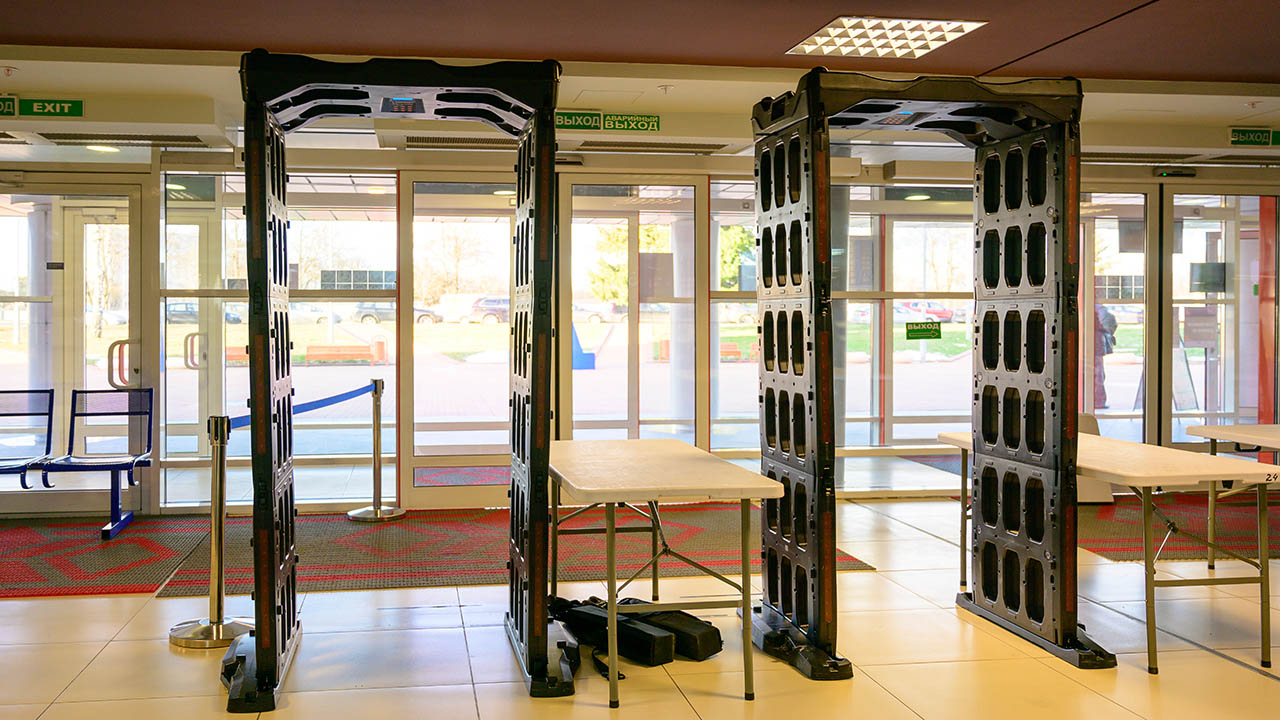 Photo of a metal detector frame in a building.