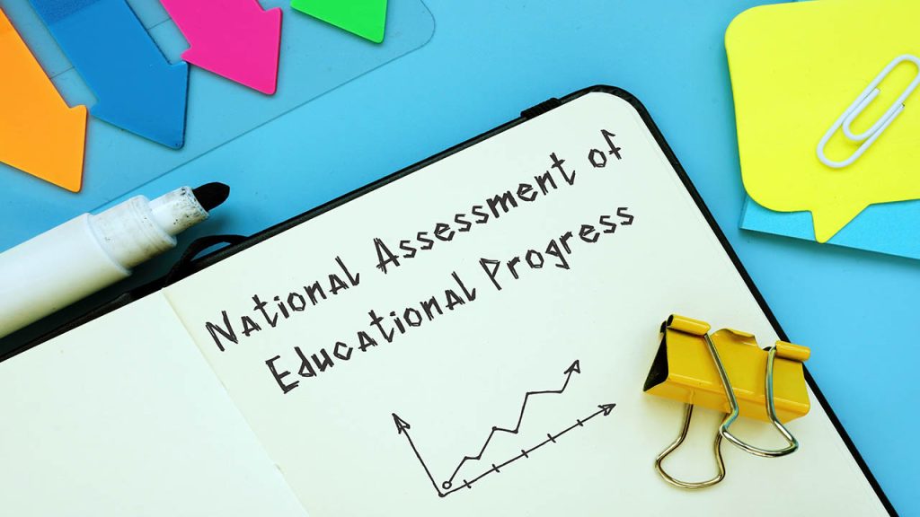 Educational concept about National Assessment of Educational Progress NAEP with sign on the page.