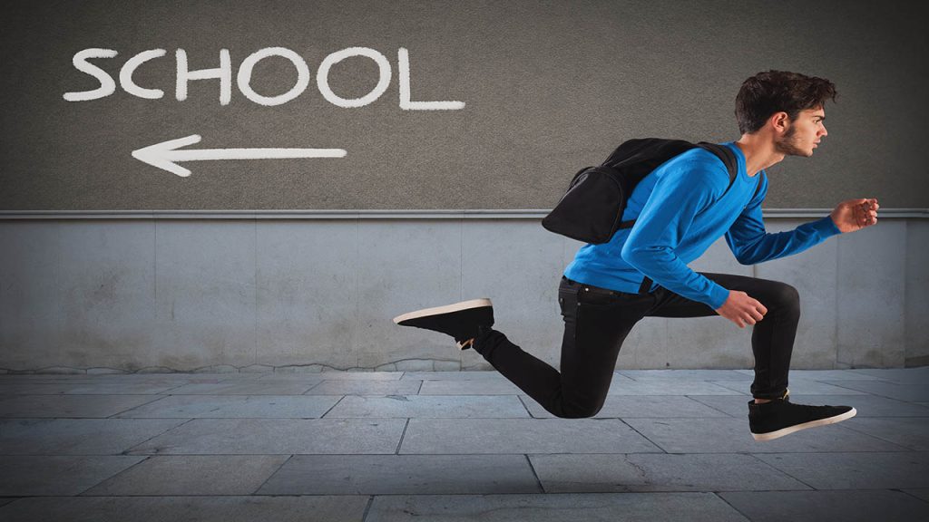 Boy with backpack escapes from the school